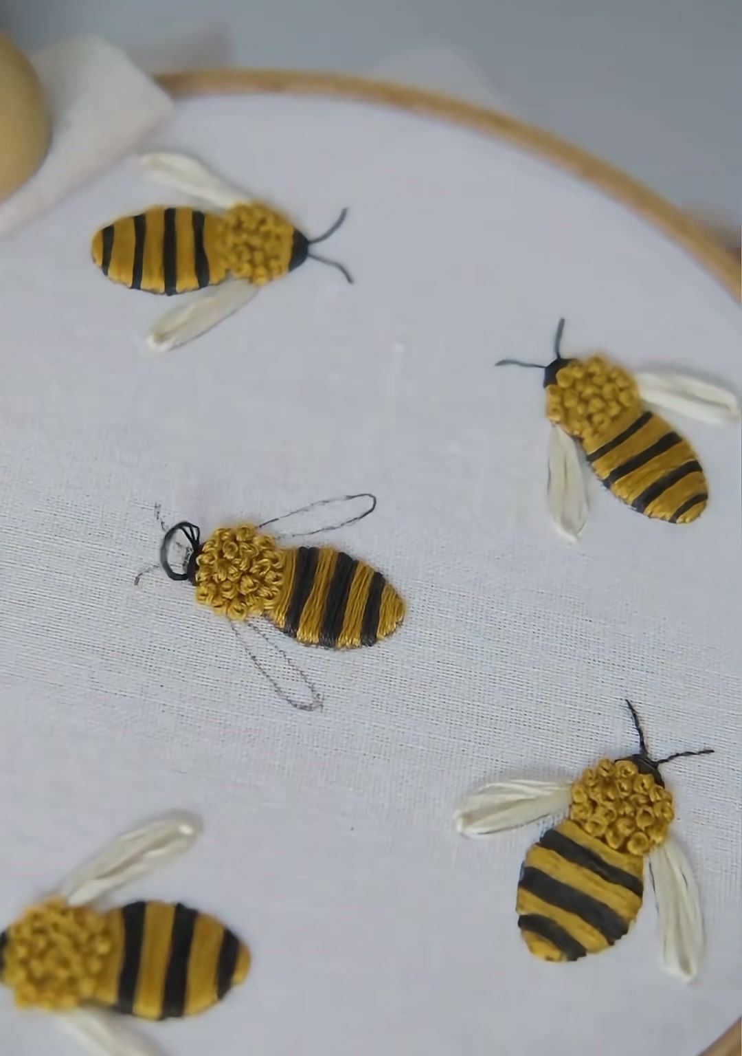 Step 07 — Black head and antennae finished, white wings beginning