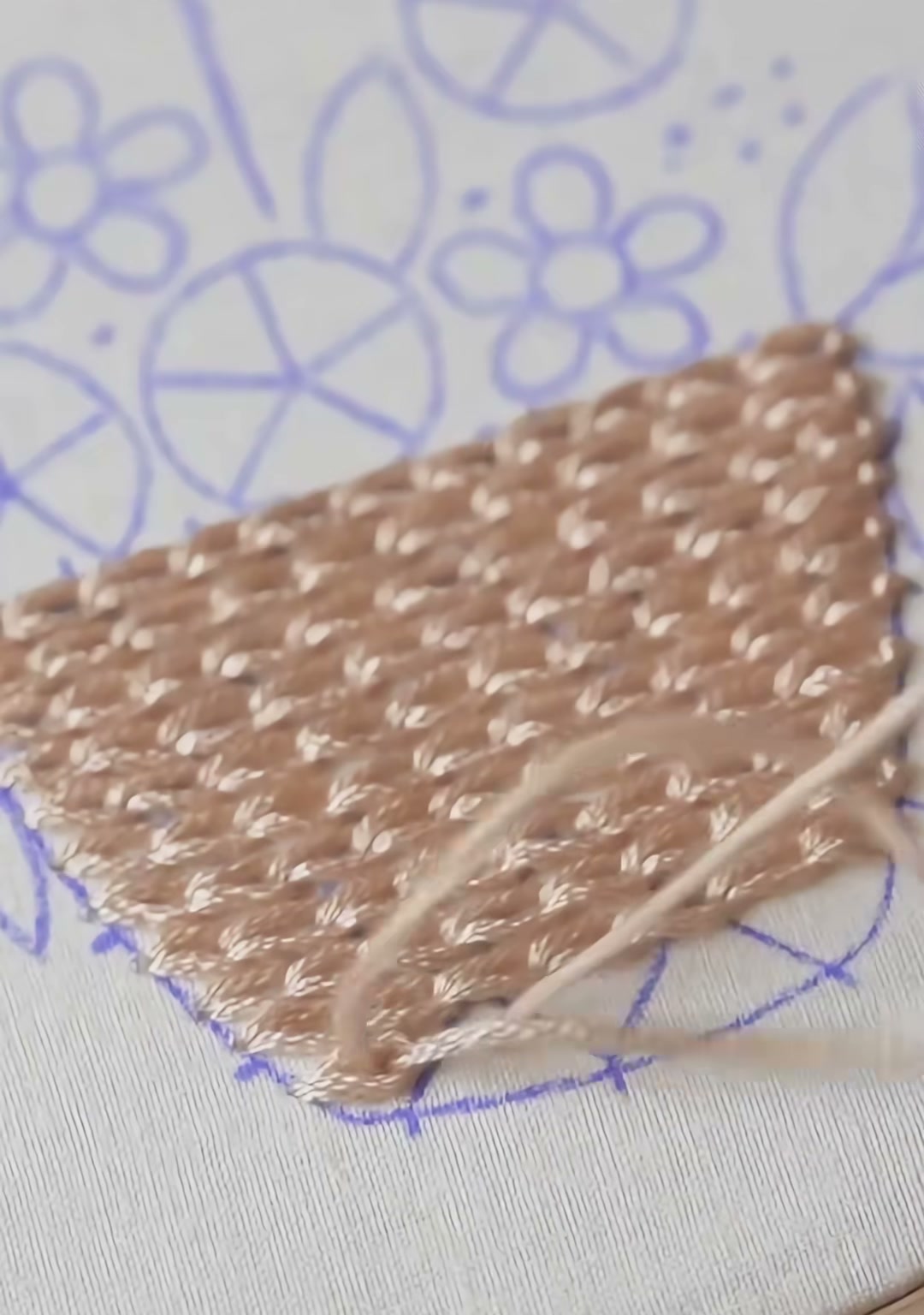 Step 03 — Two white vertical lines stitched over the tan basket weave