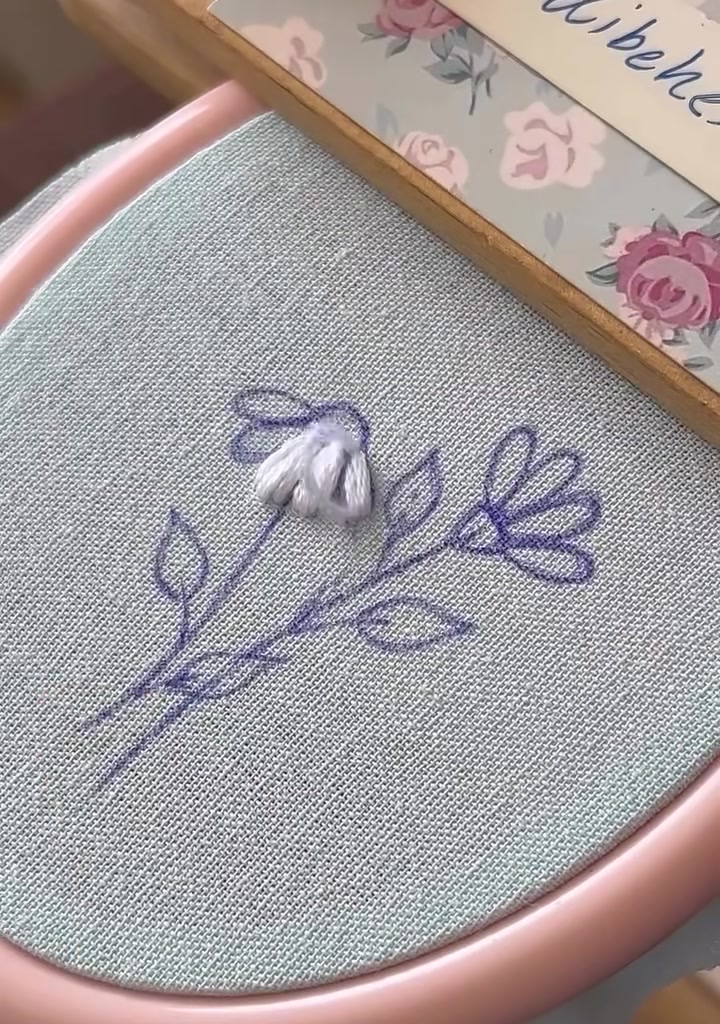 First daisy petals fully stitched and neatly arranged