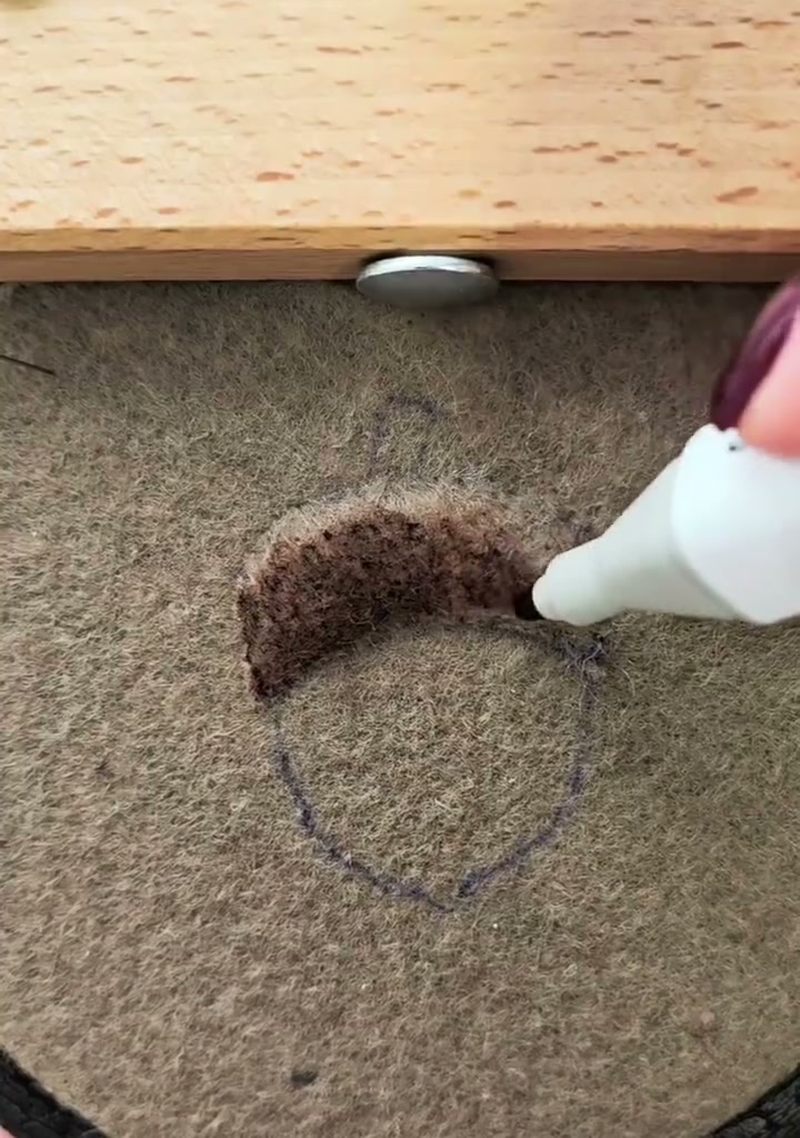Step 12 — The acorn cap fully colored in dark brown, with the body still left plain